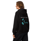 Blue Nokia QuotZee unisex oversized heavyweight hoodie showing the back detail and relaxed fit.